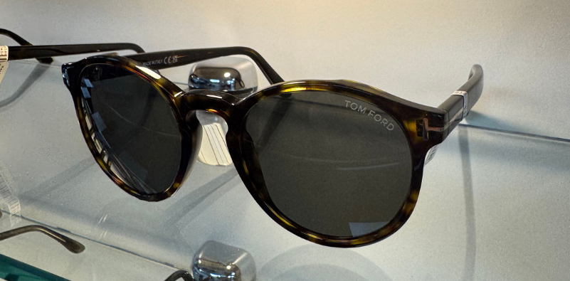 A pair of round, dark tortoiseshell Tom Ford sunglasses